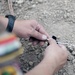 Iraqi EOD connects blasting caps to detonation cord