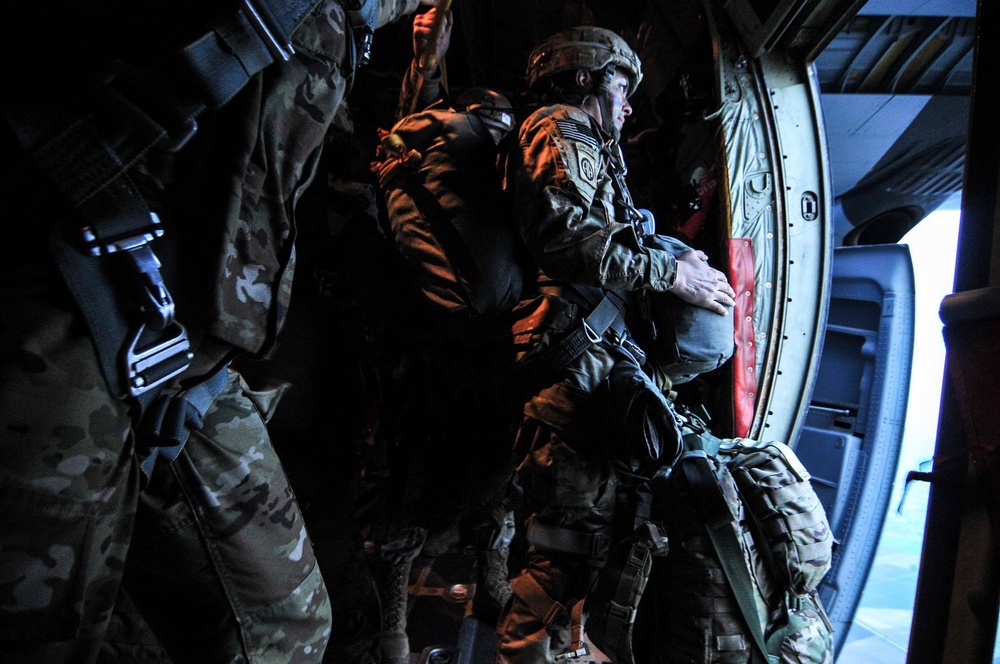 Female Paratrooper Prepares to Exit C130