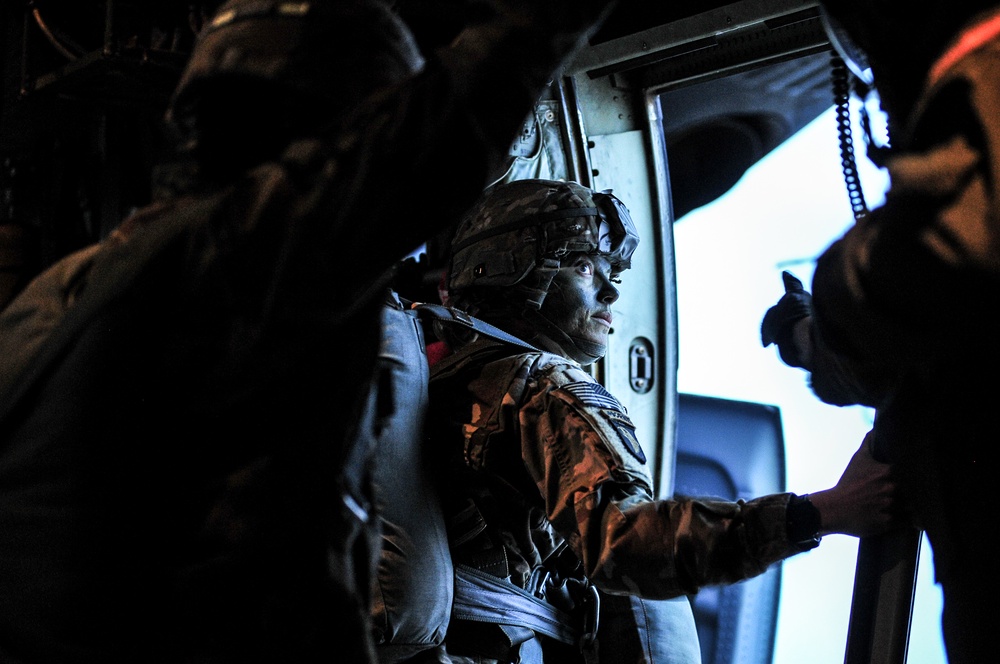 173rd Airborne Brigade Jumpmaster Receives the Thirty Second Notification from Load Master