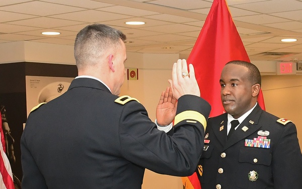 Brig. Gen. Mark Strong host the promotion ceremony of Maj. Linwood Hilton