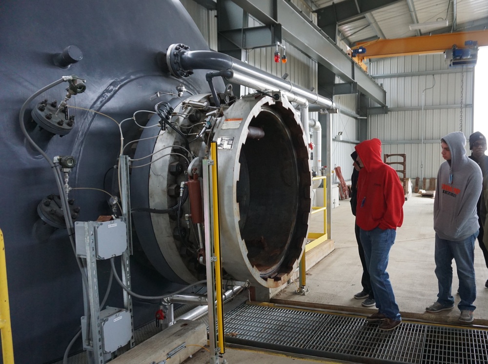 U.S. Air Force JROTC cadets from Cathedral Preparatory School, Erie, Pennsylvania inspect Letterkenny Munitions Center’s Ammonium Perchlorate Rocket Motor Thermal Destruction Chamber while touring the facilities.