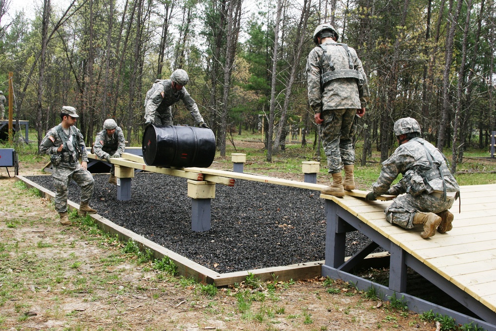 757th Transportation Battalion Soldiers complete obstacle course training in 2015 at Fort McCoy