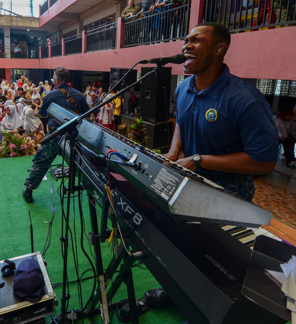 U.S. Pacific Fleet Band plays at a nursing school in Bengkulu, Indonesia.
