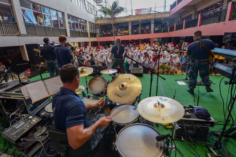 U.S. Pacific Fleet Band plays at a nursing school in Bengkulu, Indonesia.