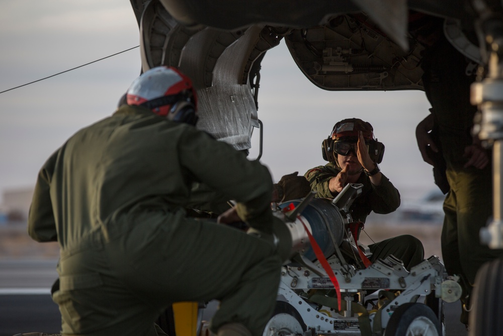 U.S. Marines refuel and hot load F-35s