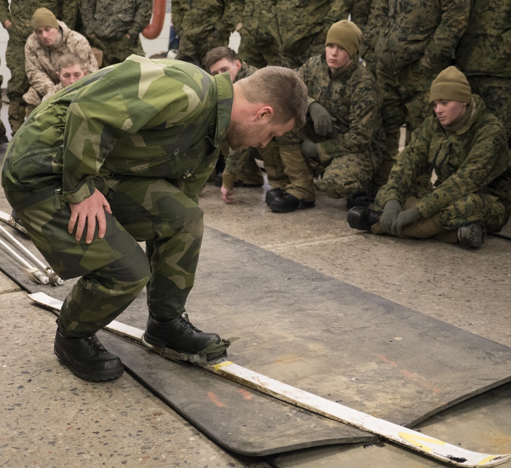 Marines check out Swedish equipment during Winter Sun 18