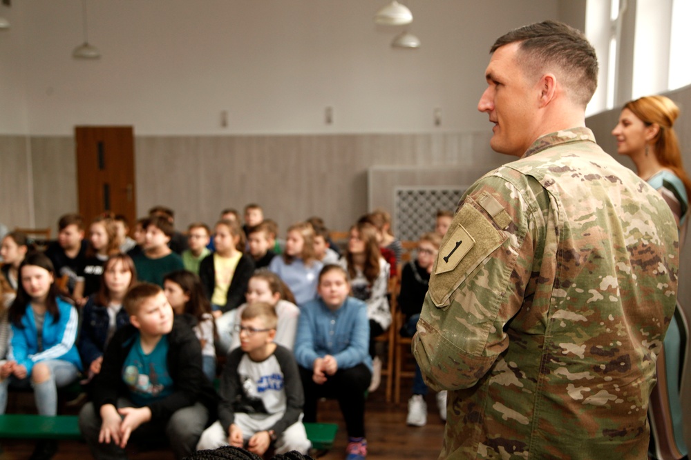 Soldiers answer tough questions during elementary school visit in Poland