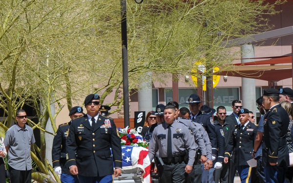 Soldiers salute casket of MP who died from cancer