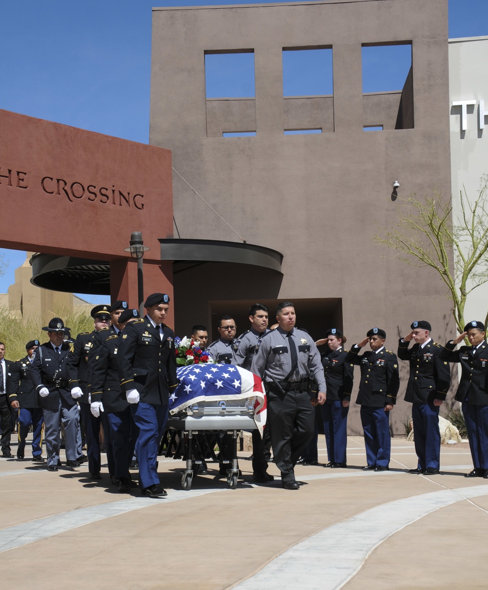 Joint Nevada National Guard and Nevada Highway Patrol honor guard escort MP's casket