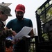 Mass. Guard Soldiers receive coin from JSOC commander