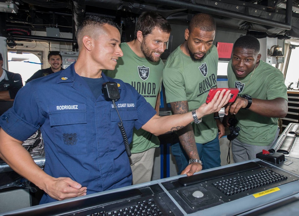 Oakland Raiders visit Coast Guard Island