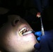 31st MEU dental officer extracts wisdom teeth while underway