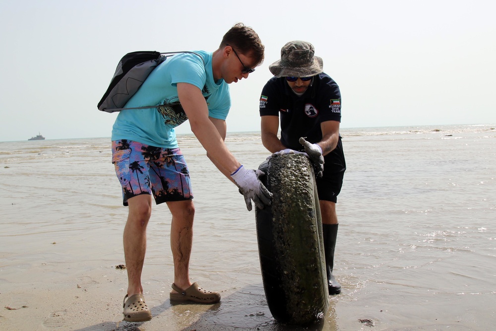 Task Force Spartan Soldiers join embassy staff, concerned citizens in beach cleanup