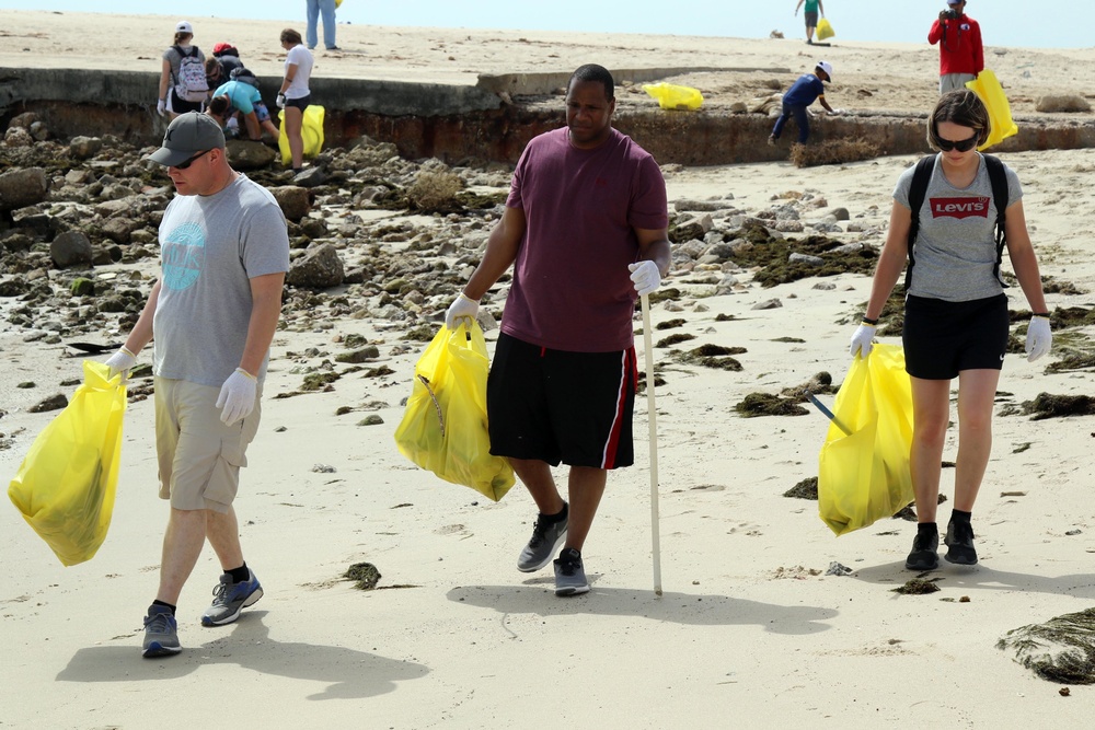 Task Force Spartan Soldiers join embassy staff, concerned citizens in beach cleanup