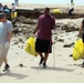 Task Force Spartan Soldiers join embassy staff, concerned citizens in beach cleanup