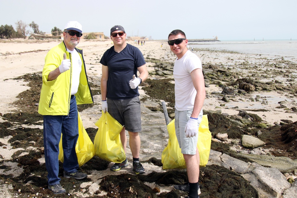 Task Force Spartan Soldiers join embassy staff, concerned citizens in beach cleanup