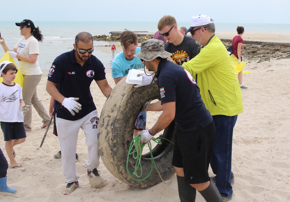 Task Force Spartan Soldiers join embassy staff, concerned citizens in beach cleanup