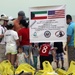 Task Force Spartan Soldiers join embassy staff, concerned citizens in beach cleanup