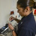 Sailor performs daily water checks aboard USNS Mercy