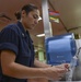 Sailor performs daily water checks aboard USNS Mercy