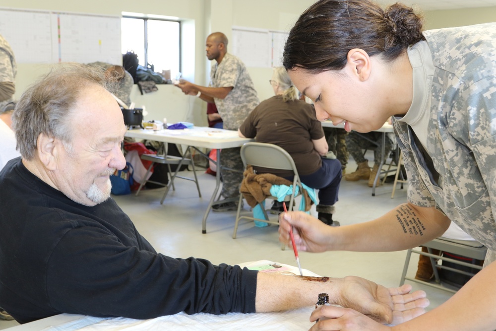 Civilian role players gear up for evacuation exercise