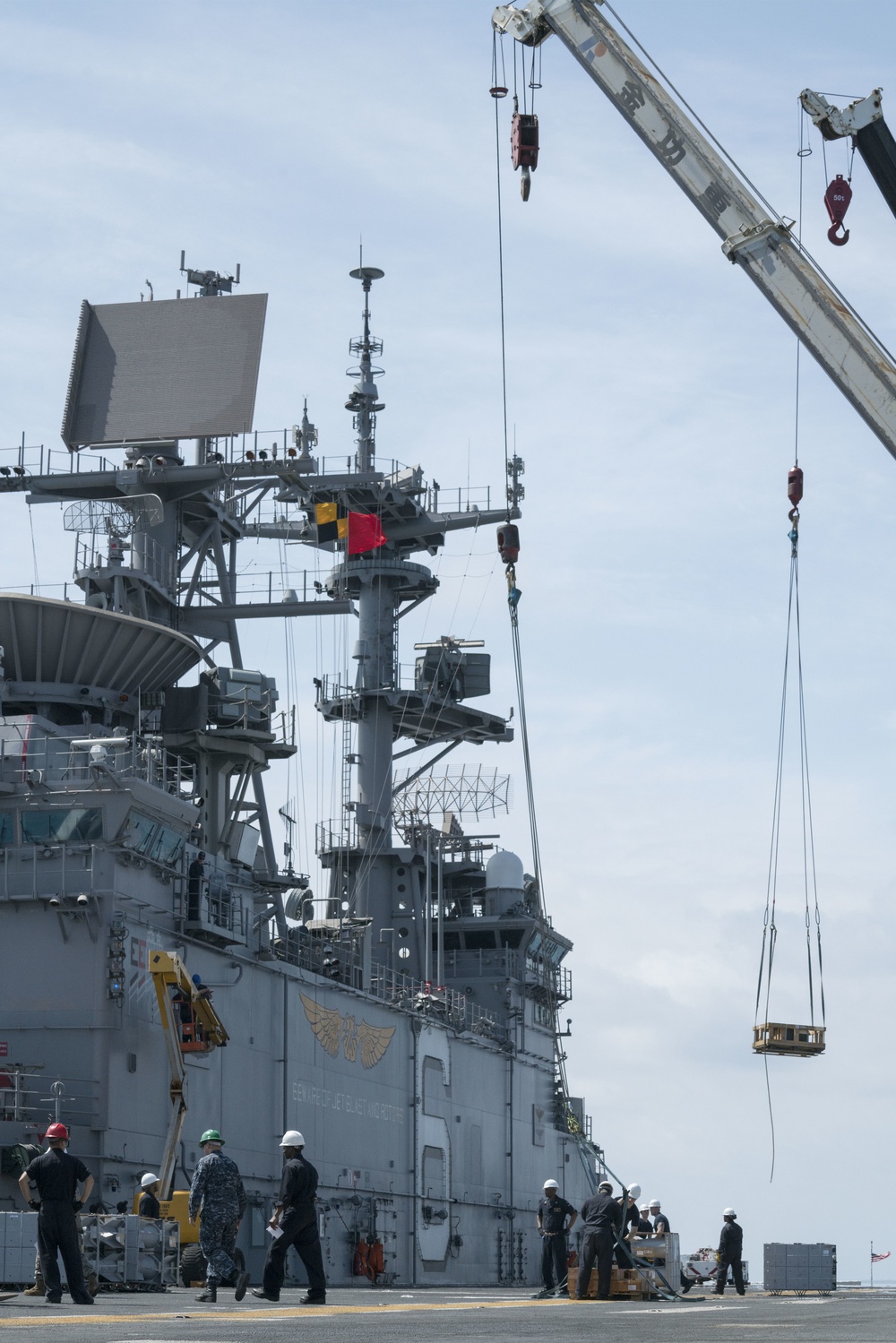 USS Bonhomme Richard Sailors Conduct Ammunition OffLoad