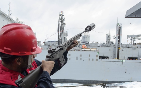 USS Mustin (DDG 89) conducts a replenishment-at-sea with USNS Matthew Perry (T-AKE-9)