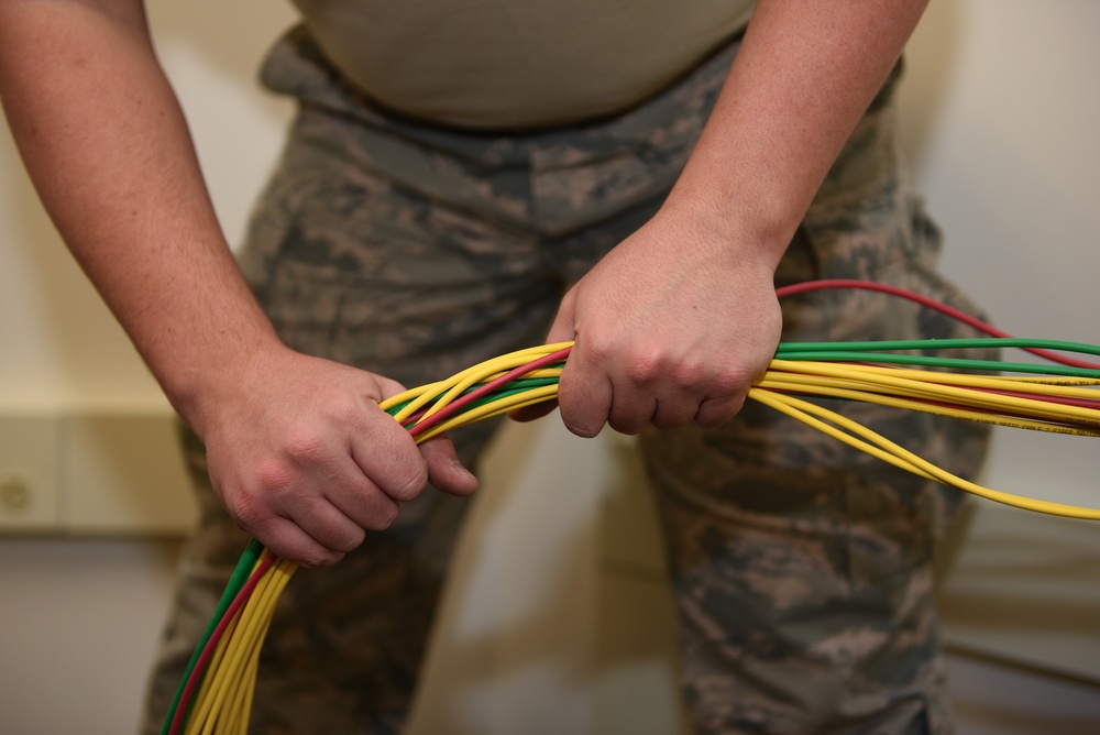 Airmen from 202nd ISS recycle materials on drill weekend