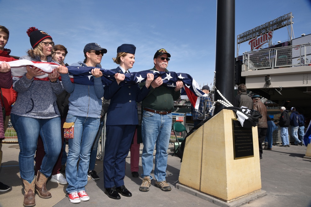 119th Wing member joins her father for flag raising at Minnesota Twins baseball game