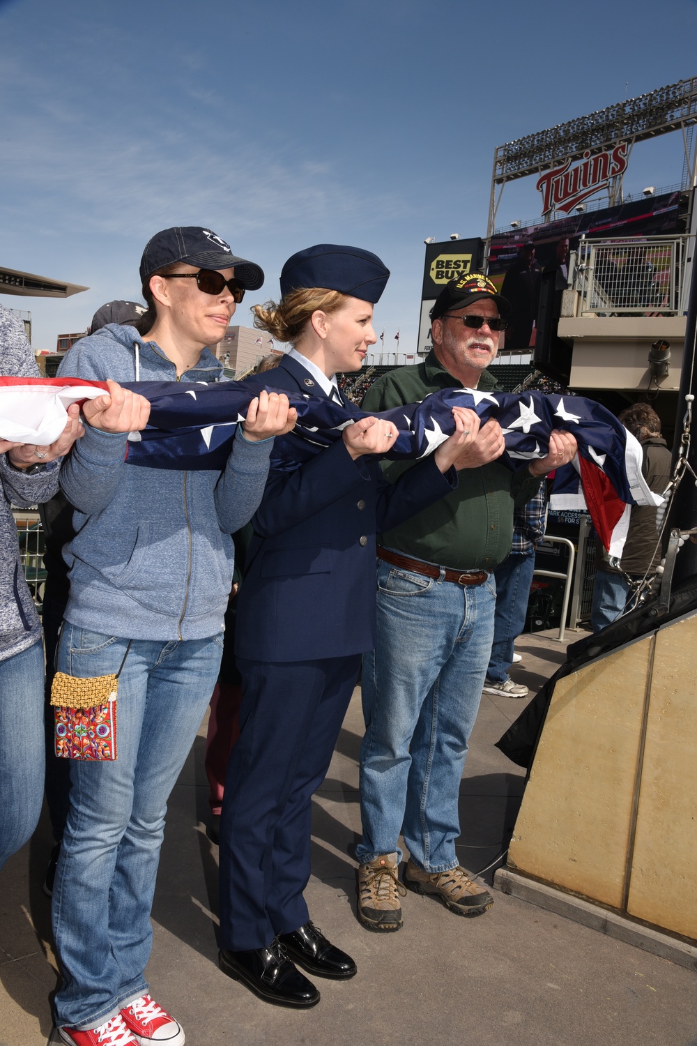 119th Wing member joins her father for flag raising at Minnesota Twins baseball game