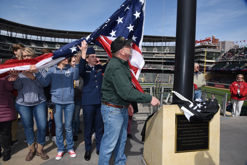 119th Wing member joins her father for flag raising at Minnesota Twins baseball game