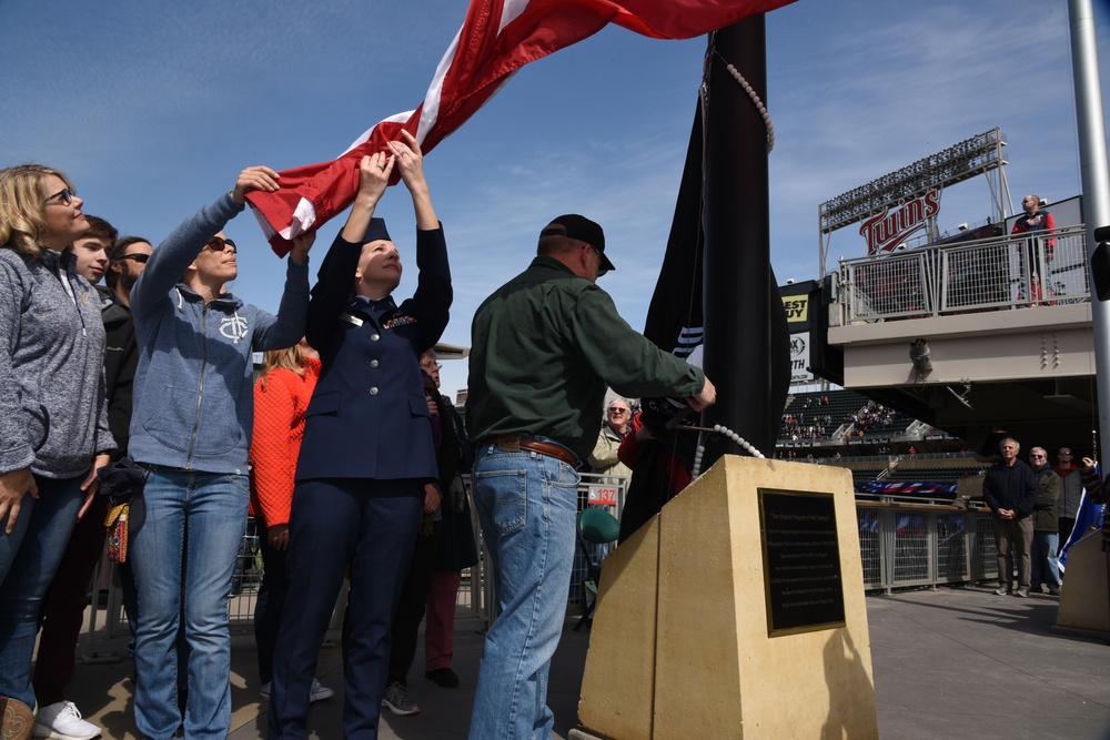 119th Wing member joins her father for flag raising at Minnesota Twins baseball game