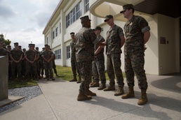 3rd Marine Division Commanding General Maj. Gen. Craig Q. Timberlake presents to coin to 3rd Reconnaissance Battalion Marine