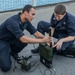Service members conduct communications training aboard USNS Mercy