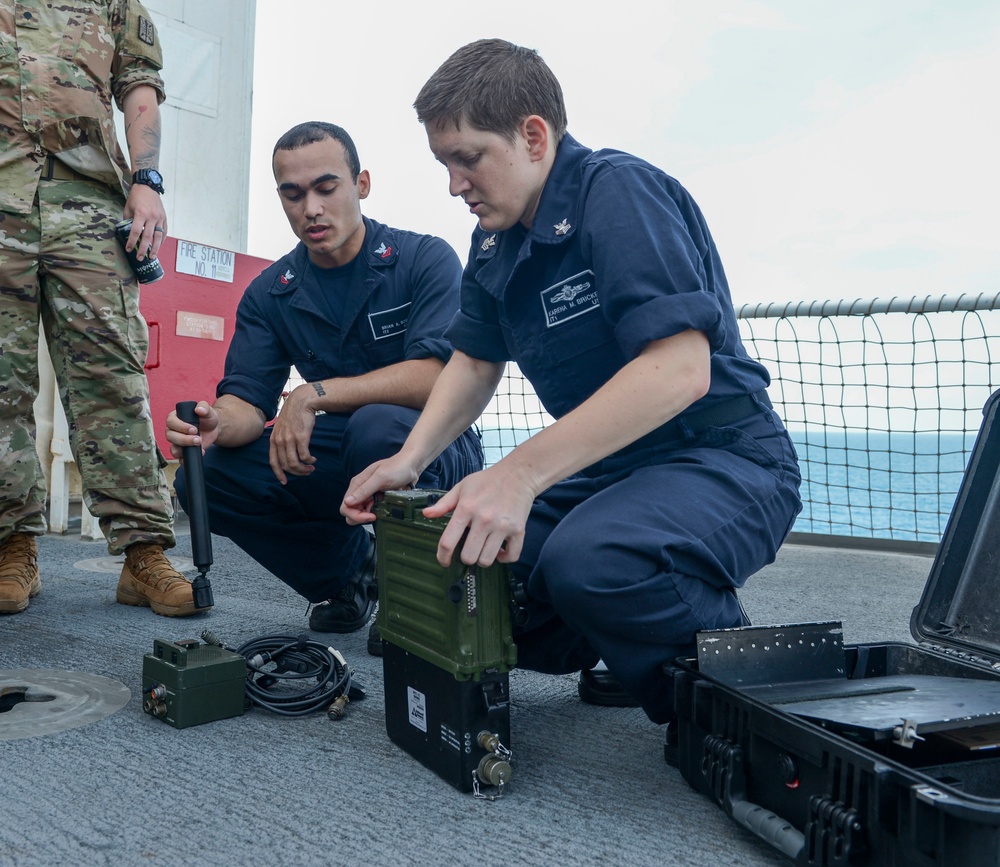 Service members conduct communications training aboard USNS Mercy