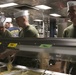 31st MEU’s Sgt. Maj., CO, and Chaplains serve dinner to Marines and Sailors