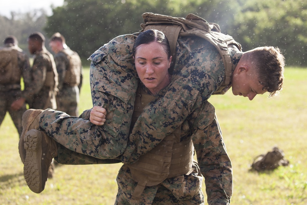 Together as a team, Hawaii Marines receive instructor tab