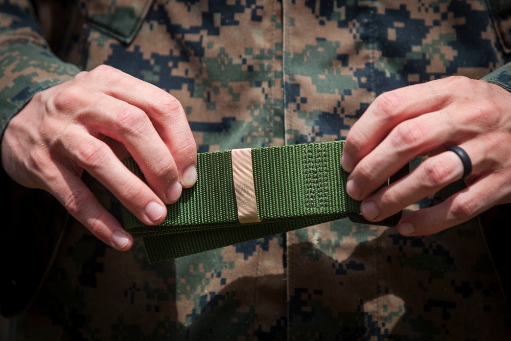 Together as a team, Hawaii Marines receive instructor tab