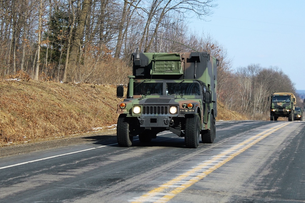 Convoy of vehicles heading for training at Fort McCoy