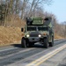 Convoy of vehicles heading for training at Fort McCoy