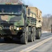 Convoy of vehicles heading for training at Fort McCoy