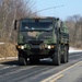 Convoy of vehicles heading for training at Fort McCoy