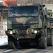 Convoy of vehicles heading for training at Fort McCoy