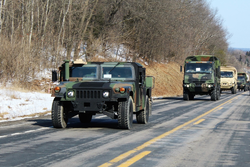 Convoy of vehicles heading for training at Fort McCoy