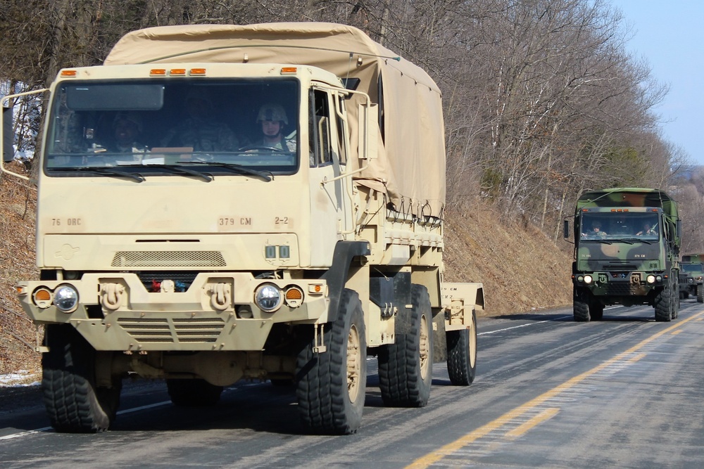 Convoy of vehicles heading for training at Fort McCoy