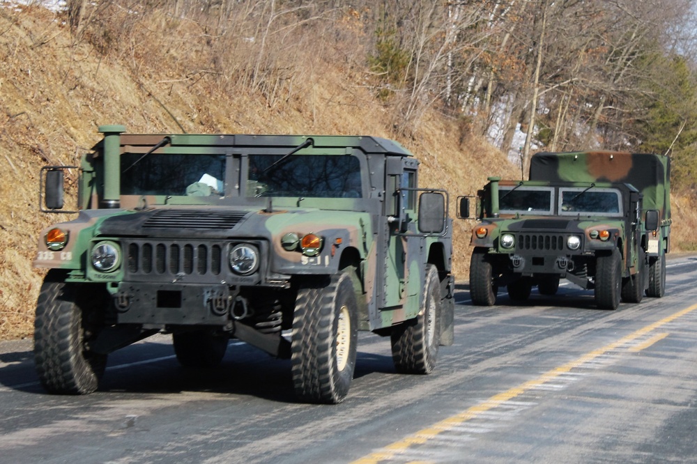 Convoy of vehicles heading for training at Fort McCoy