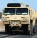 Convoy of vehicles heading for training at Fort McCoy