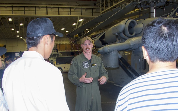 USS Bonhomme Richard (LHD 6) hosts open ship tours during White Beach Festival in Okinawa, Japan.