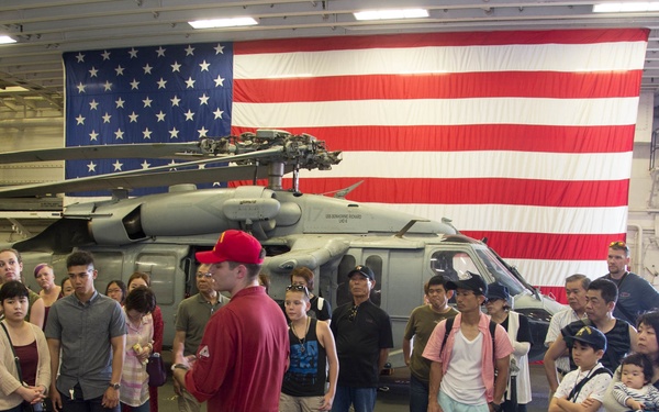 USS Bonhomme Richard (LHD 6) hosts open ship tours during White Beach Festival in Okinawa, Japan.