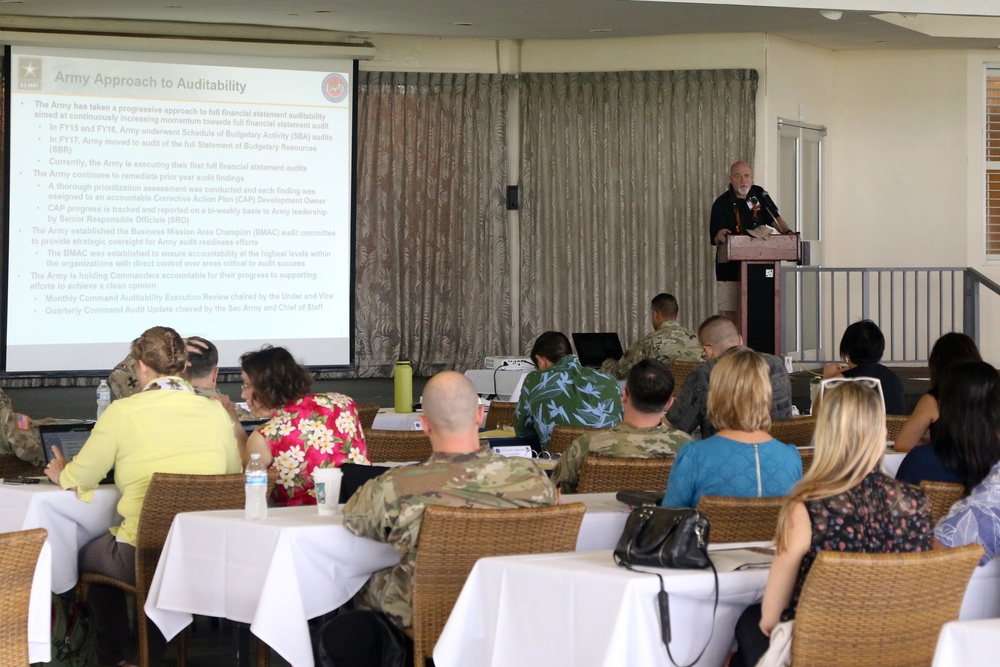 Wes Miller speaks to G-8 personnel
